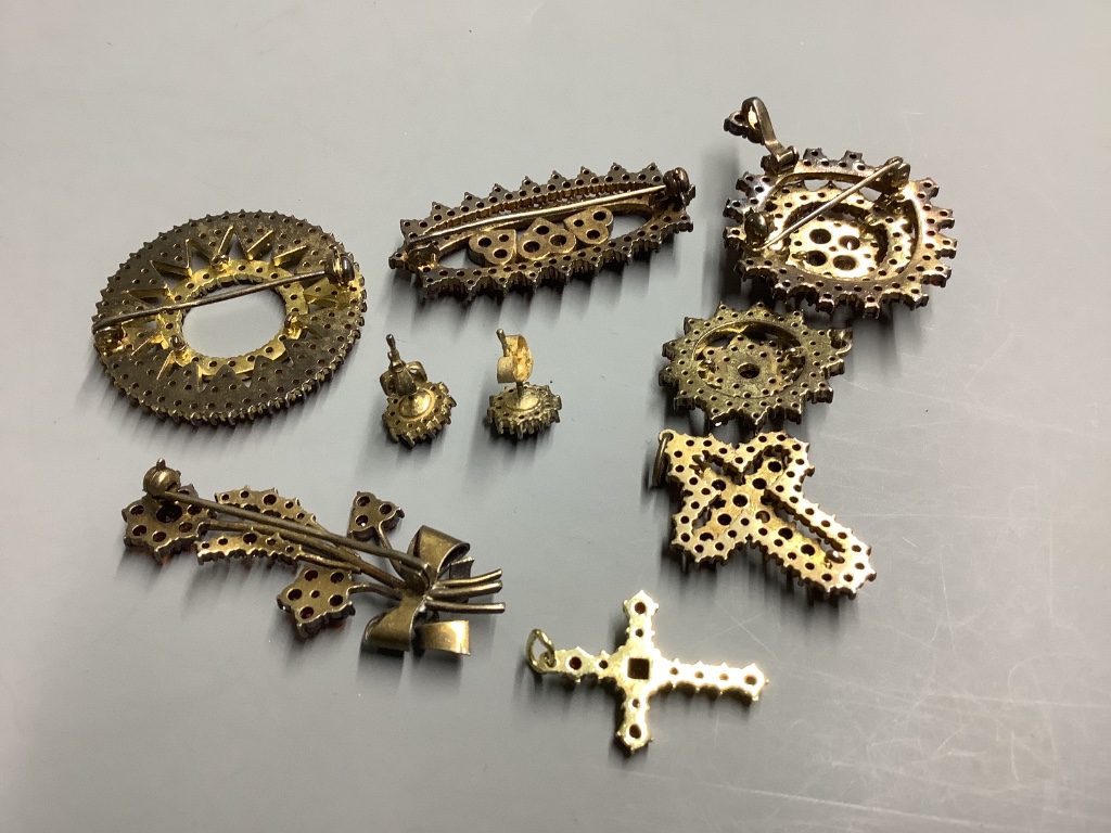 A group of facetted garnet set jewellery, including brooches, pendants and ear studs